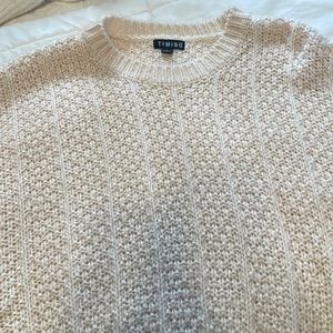 Too short for my long torso but would be very cute over a button down!